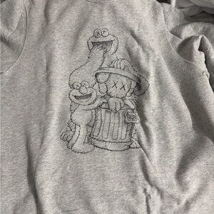Uniqlo x KAWS Gray Sweatshirt with Black Sketch Characters
